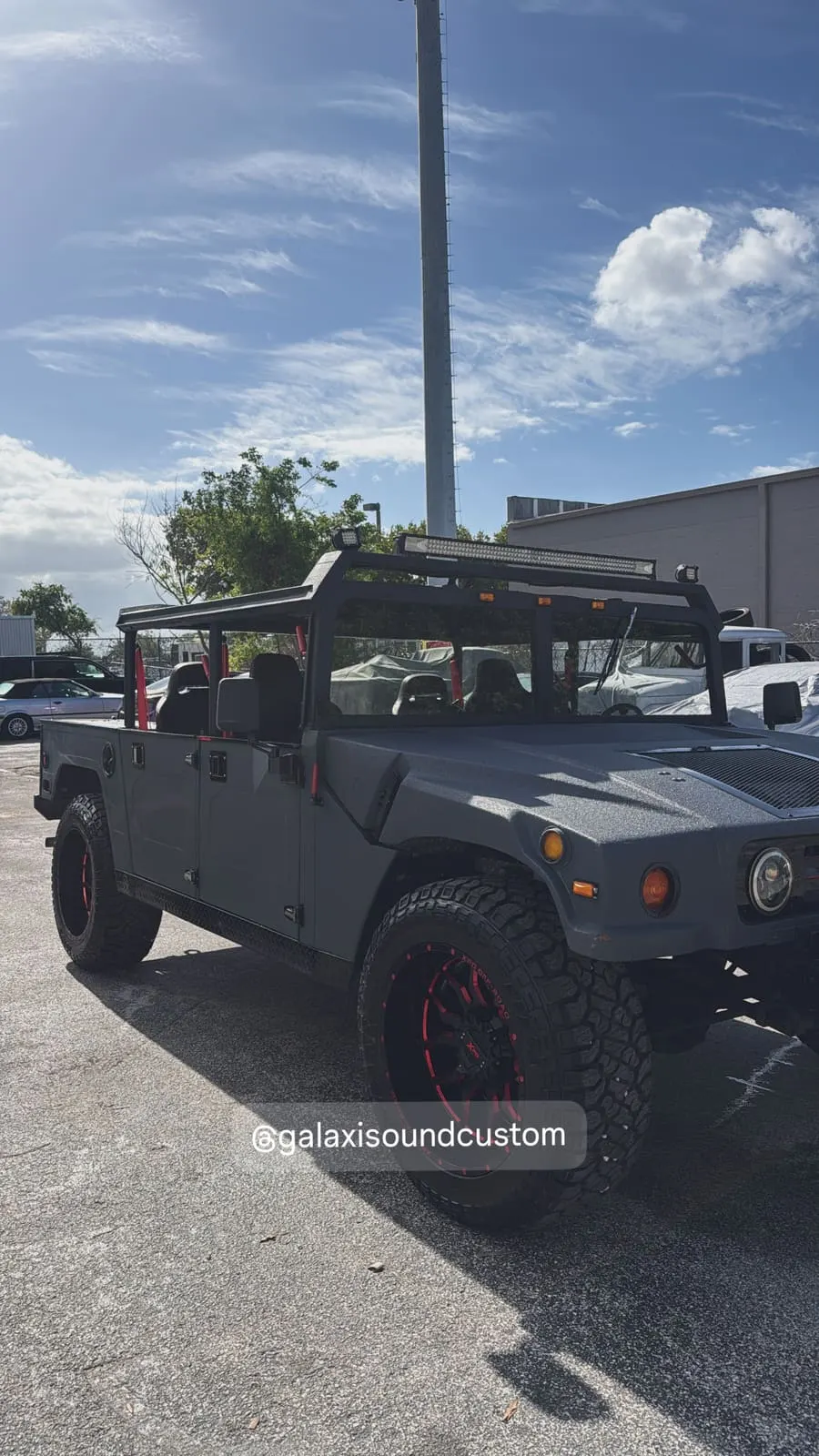 After: Matte black Hummer H1 vinyl wrap Miami Galaxi Sound